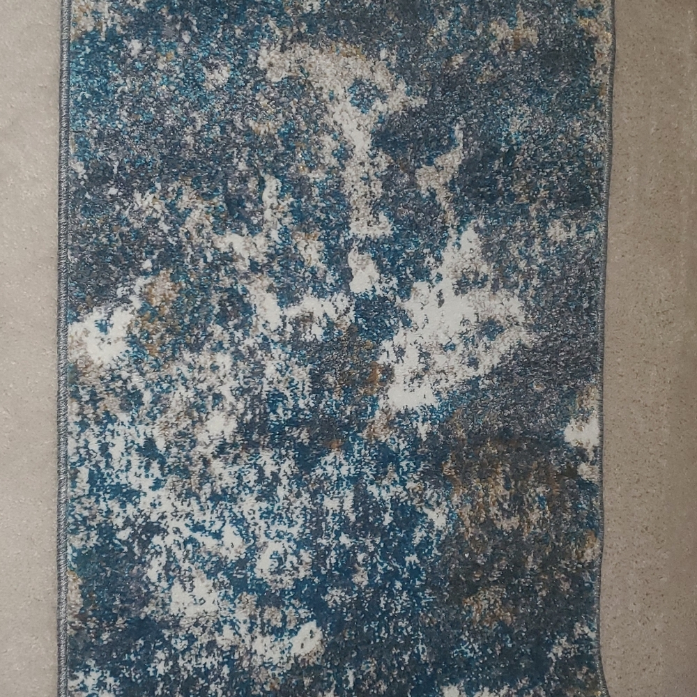 Two Matching Accent Rugs